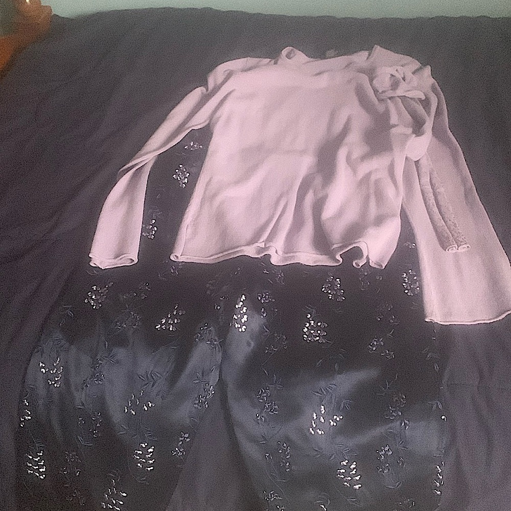 Purple, long sleeve shirt with fun, floral, navy, and purple pants